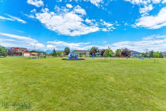 1008 E Missoula, Belgrade, MT 59714 - view of grassy yard with a playground and a gazebo