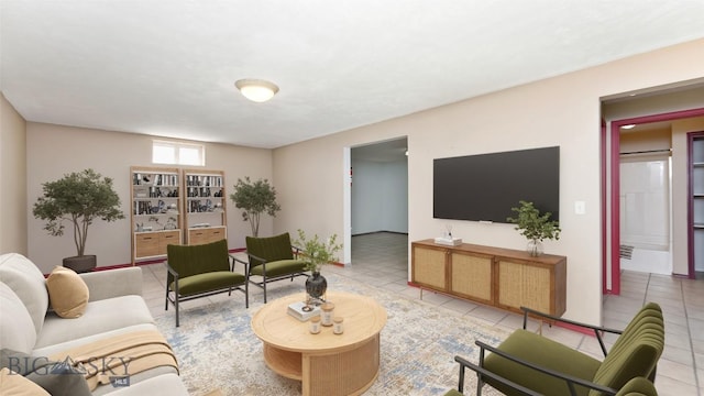 1008 E Missoula, Belgrade, MT 59714 - living room featuring tile patterned floors and baseboards