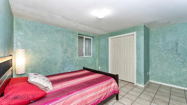 1008 E Missoula, Belgrade, MT 59714 - bedroom with tile patterned flooring and a closet