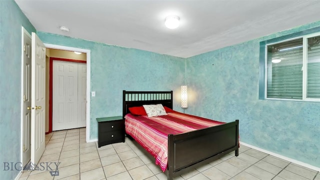 1008 E Missoula, Belgrade, MT 59714 - bedroom with tile patterned floors and baseboards