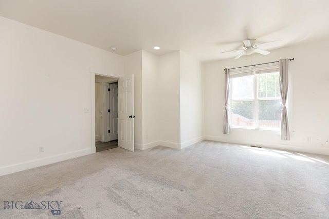 894 Rogers, Bozeman, MT 59718 - carpeted spare room featuring baseboards and a ceiling fan