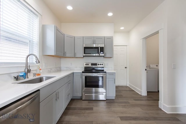 894 Rogers, Bozeman, MT 59718 - kitchen with stainless steel appliances, light countertops, gray cabinets, dark wood-style flooring, and recessed lighting