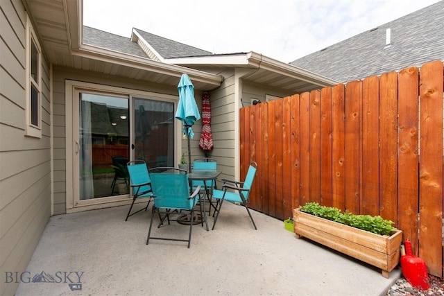 86 Tail Feather Unit C, Bozeman, MT 59718 - view of patio / terrace with outdoor dining area