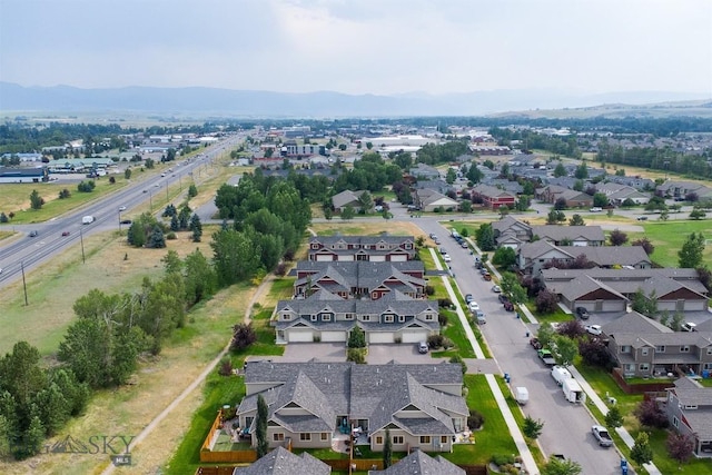 86 Tail Feather Unit C, Bozeman, MT 59718 - aerial overview of property's location with mountains and nearby suburban area
