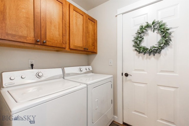 86 Tail Feather Unit C, Bozeman, MT 59718 - laundry area featuring washer and dryer and cabinet space