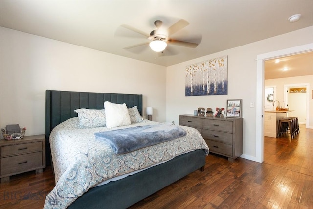 86 Tail Feather Unit C, Bozeman, MT 59718 - bedroom featuring wood-type flooring and a ceiling fan