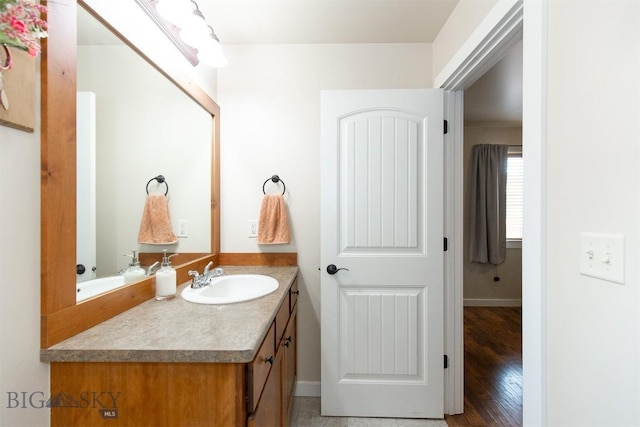 86 Tail Feather Unit C, Bozeman, MT 59718 - bathroom with vanity and wood finished floors
