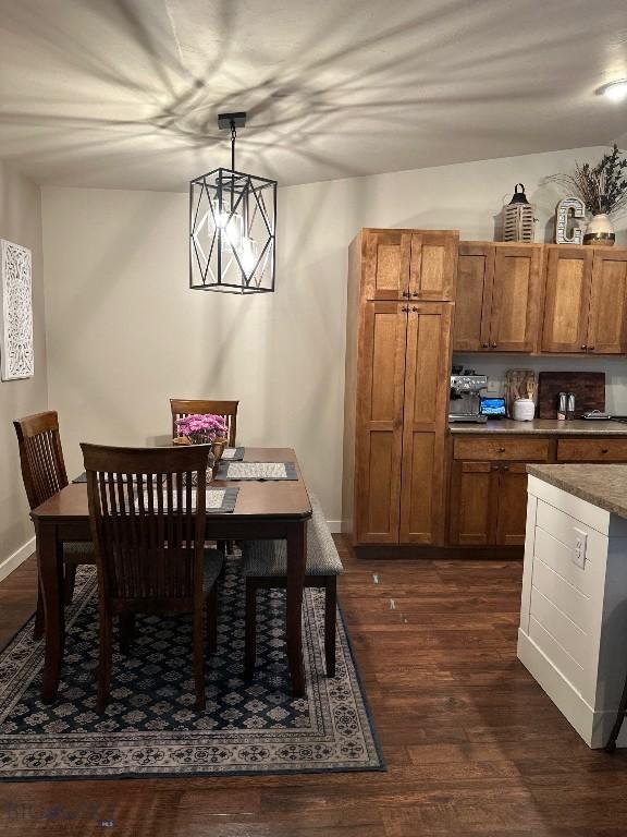 86 Tail Feather Unit C, Bozeman, MT 59718 - dining space with dark wood-style flooring and baseboards