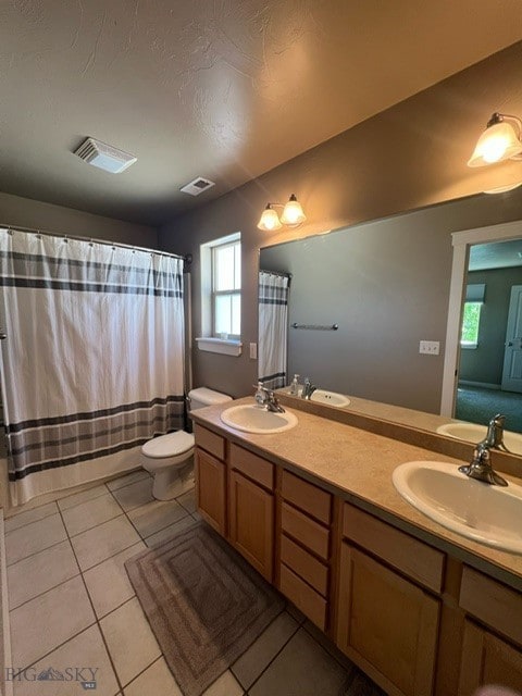 3885 Equestrian Ln, Bozeman, MT 59718 - full bathroom with double vanity and tile patterned flooring