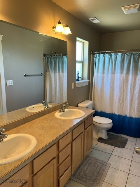 3885 Equestrian Ln, Bozeman, MT 59718 - bathroom featuring tile patterned floors, double vanity, and curtained shower
