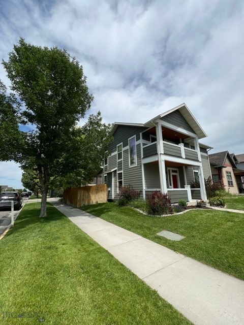 3885 Equestrian Ln, Bozeman, MT 59718 - view of side of home with covered porch and a balcony