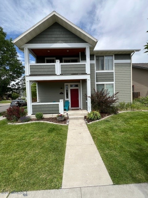 3885 Equestrian Ln, Bozeman, MT 59718 - view of front of house featuring a balcony and a front lawn