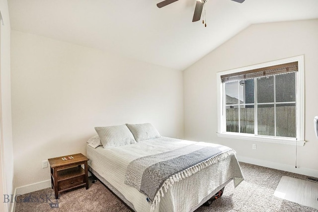 708 Pierre St, Belgrade, MT 59714 - carpeted bedroom featuring vaulted ceiling and a ceiling fan