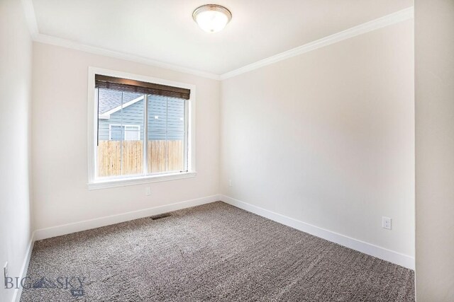 708 Pierre St, Belgrade, MT 59714 - carpeted empty room with crown molding