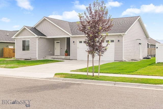 708 Pierre St, Belgrade, MT 59714 - view of front of property featuring concrete driveway, a garage, and roof with shingles