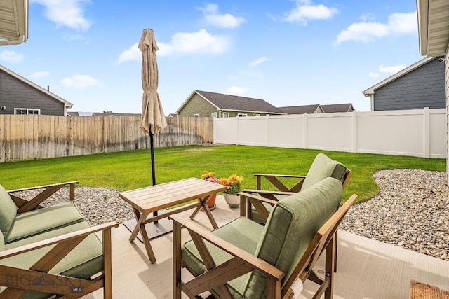 708 Pierre St, Belgrade, MT 59714 - fenced backyard featuring a patio and outdoor dining area