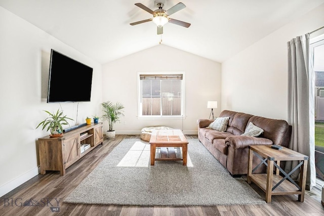 708 Pierre St, Belgrade, MT 59714 - living room featuring vaulted ceiling, ceiling fan, and wood finished floors