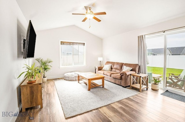 708 Pierre St, Belgrade, MT 59714 - living room with ceiling fan, wood finished floors, and lofted ceiling