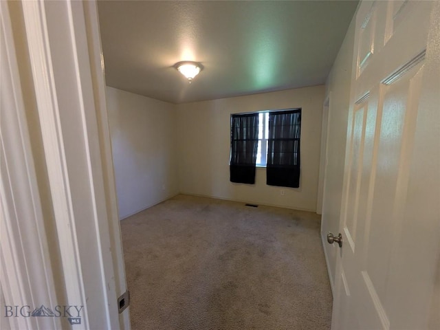 477 W River Rock, Belgrade, MT 59714 - empty room with carpet flooring