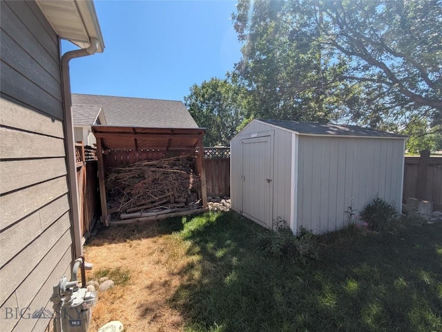477 W River Rock, Belgrade, MT 59714 - fenced backyard with a shed