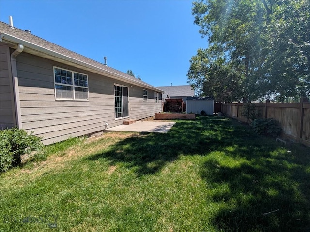 477 W River Rock, Belgrade, MT 59714 - fenced backyard with a storage shed and a patio