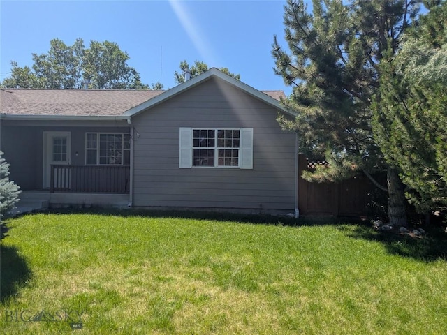 477 W River Rock, Belgrade, MT 59714 - view of side of property featuring a porch and roof with shingles