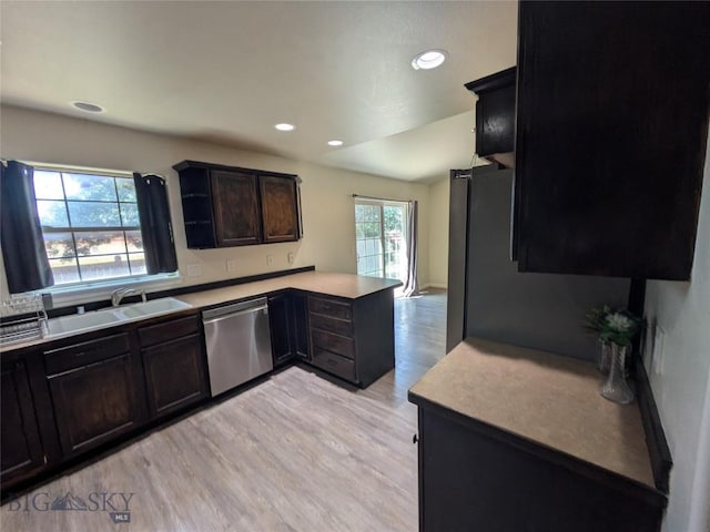 477 W River Rock, Belgrade, MT 59714 - kitchen with stainless steel dishwasher, a peninsula, light wood-style floors, light countertops, and recessed lighting