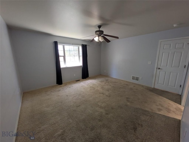 477 W River Rock, Belgrade, MT 59714 - empty room with ceiling fan, light colored carpet, and a smoke detector