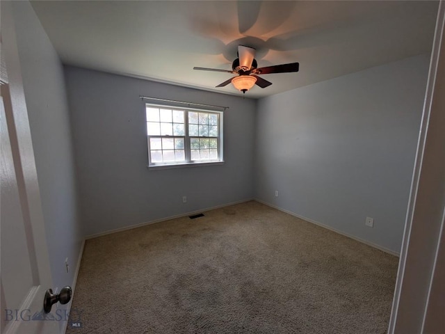 477 W River Rock, Belgrade, MT 59714 - carpeted empty room featuring a ceiling fan and baseboards