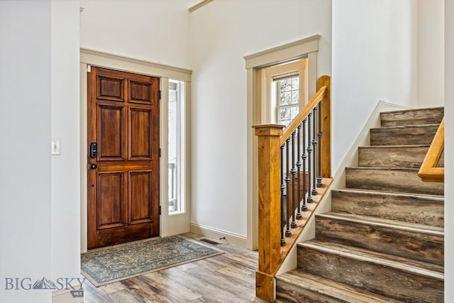 3609 Fieldstone W, Bozeman, MT 59715 - entrance foyer featuring wood finished floors and stairway