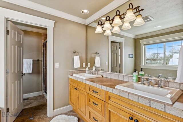 3609 Fieldstone W, Bozeman, MT 59715 - full bathroom featuring crown molding, double vanity, a stall shower, and tile patterned floors