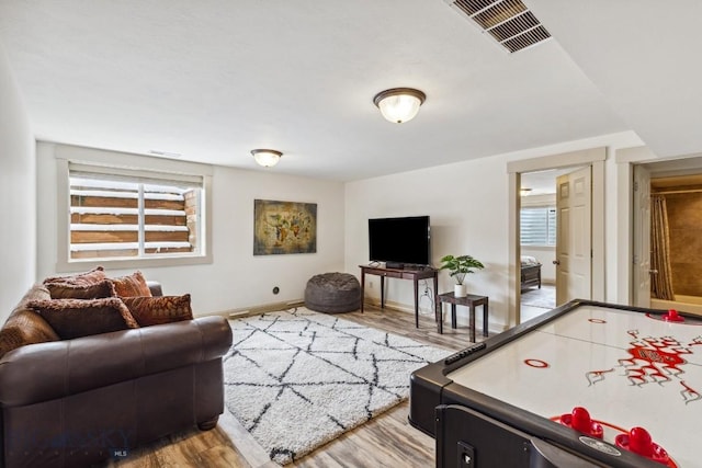 3609 Fieldstone W, Bozeman, MT 59715 - playroom featuring wood finished floors and baseboards