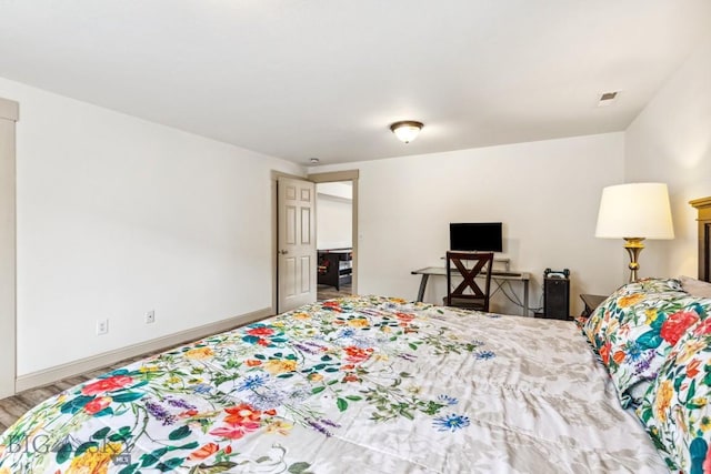 3609 Fieldstone W, Bozeman, MT 59715 - bedroom featuring wood finished floors and baseboards