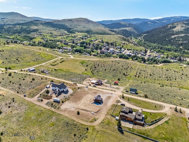 209 W Madison St, Virginia City, MT 59755 - aerial view of property and surrounding area featuring mountains and rural landscape
