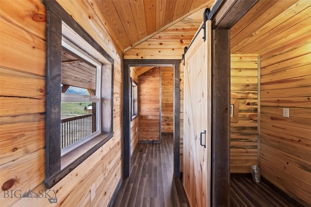 209 W Madison St, Virginia City, MT 59755 - hallway featuring wooden ceiling, wood walls, hardwood / wood-style floors, and lofted ceiling