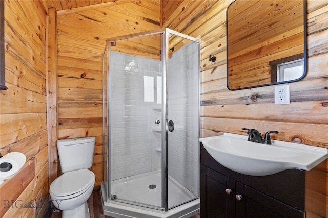 209 W Madison St, Virginia City, MT 59755 - full bathroom featuring wooden walls, a shower stall, and vanity