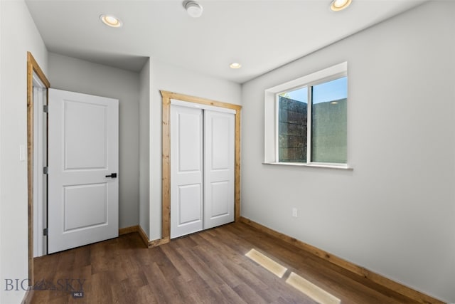 209 W Madison St, Virginia City, MT 59755 - unfurnished bedroom with dark wood-type flooring, recessed lighting, and a closet