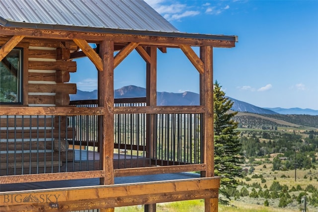 209 W Madison St, Virginia City, MT 59755 - wooden terrace featuring a mountain view