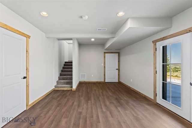 209 W Madison St, Virginia City, MT 59755 - below grade area featuring stairs, wood finished floors, and recessed lighting