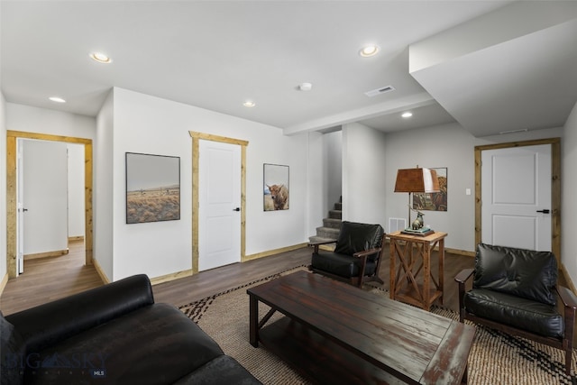 209 W Madison St, Virginia City, MT 59755 - living room featuring wood finished floors, stairway, and recessed lighting