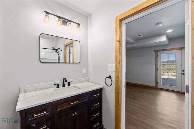 209 W Madison St, Virginia City, MT 59755 - bathroom featuring vanity and wood finished floors