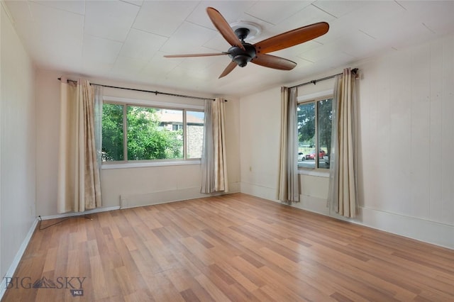 815 N Grand, Bozeman, MT 59715 - empty room with ceiling fan and light wood-style flooring