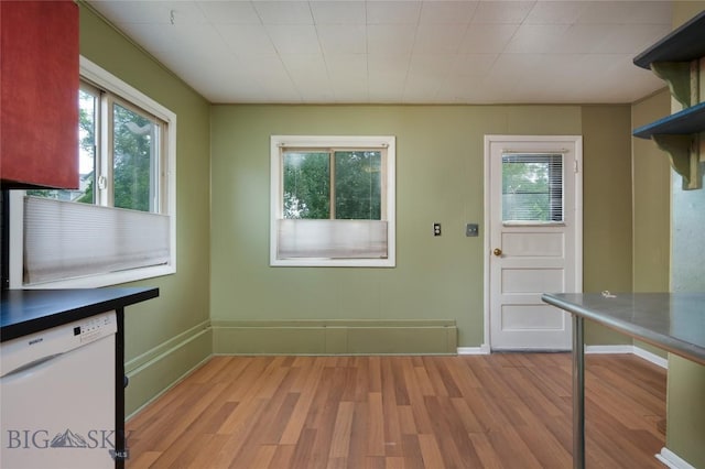 815 N Grand, Bozeman, MT 59715 - unfurnished dining area with light wood-type flooring