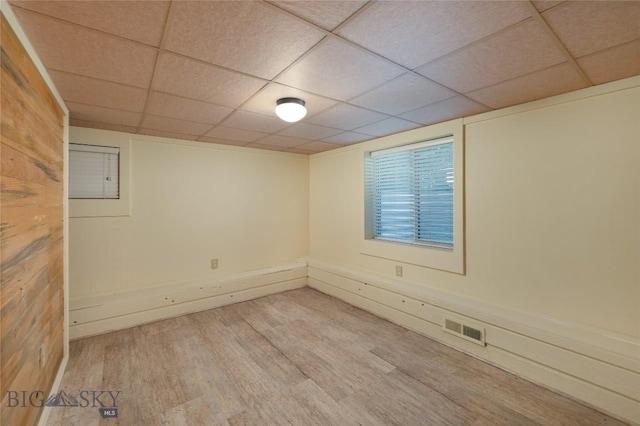 815 N Grand, Bozeman, MT 59715 - unfurnished room featuring wood finished floors and a paneled ceiling