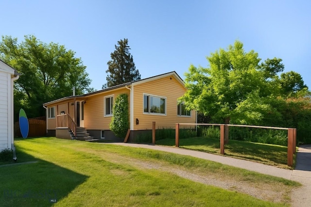 815 N Grand, Bozeman, MT 59715 - back of property featuring a yard
