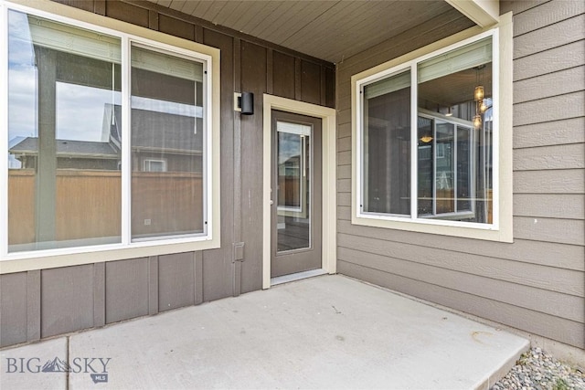 152 Goldcrest Ln, Bozeman, MT 59715 - property entrance with a patio and board and batten siding