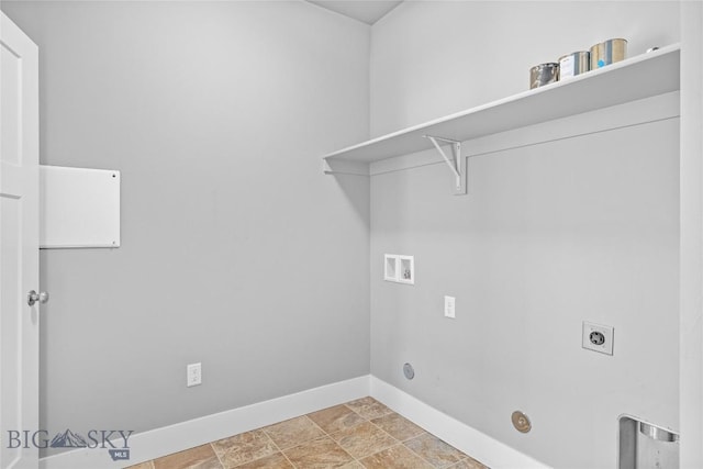 152 Goldcrest Ln, Bozeman, MT 59715 - washroom with hookup for a washing machine, gas dryer hookup, stone finish flooring, and hookup for an electric dryer