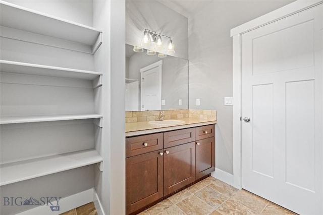 152 Goldcrest Ln, Bozeman, MT 59715 - bathroom with vanity and backsplash