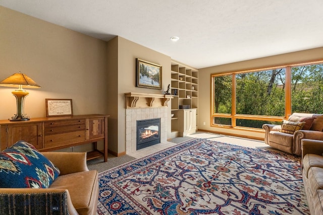 3300 E Graf Unit 26, Bozeman, MT 59715 - living room with carpet, a tile fireplace, recessed lighting, and built in features