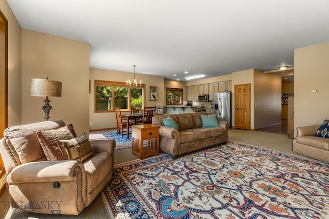3300 E Graf Unit 26, Bozeman, MT 59715 - living area featuring light carpet and a chandelier